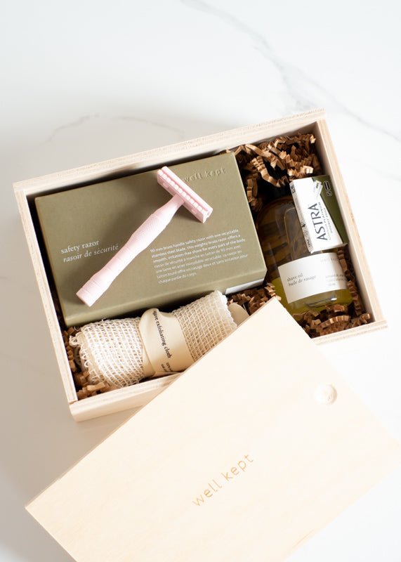 Well Kept Safety Razor Kit in Rose Pink For Environmentally-friendly Shaving Comes In A Wood Box That Includes A Razor, Blades, Shave Oil, & Agave Exfoliating Cloth